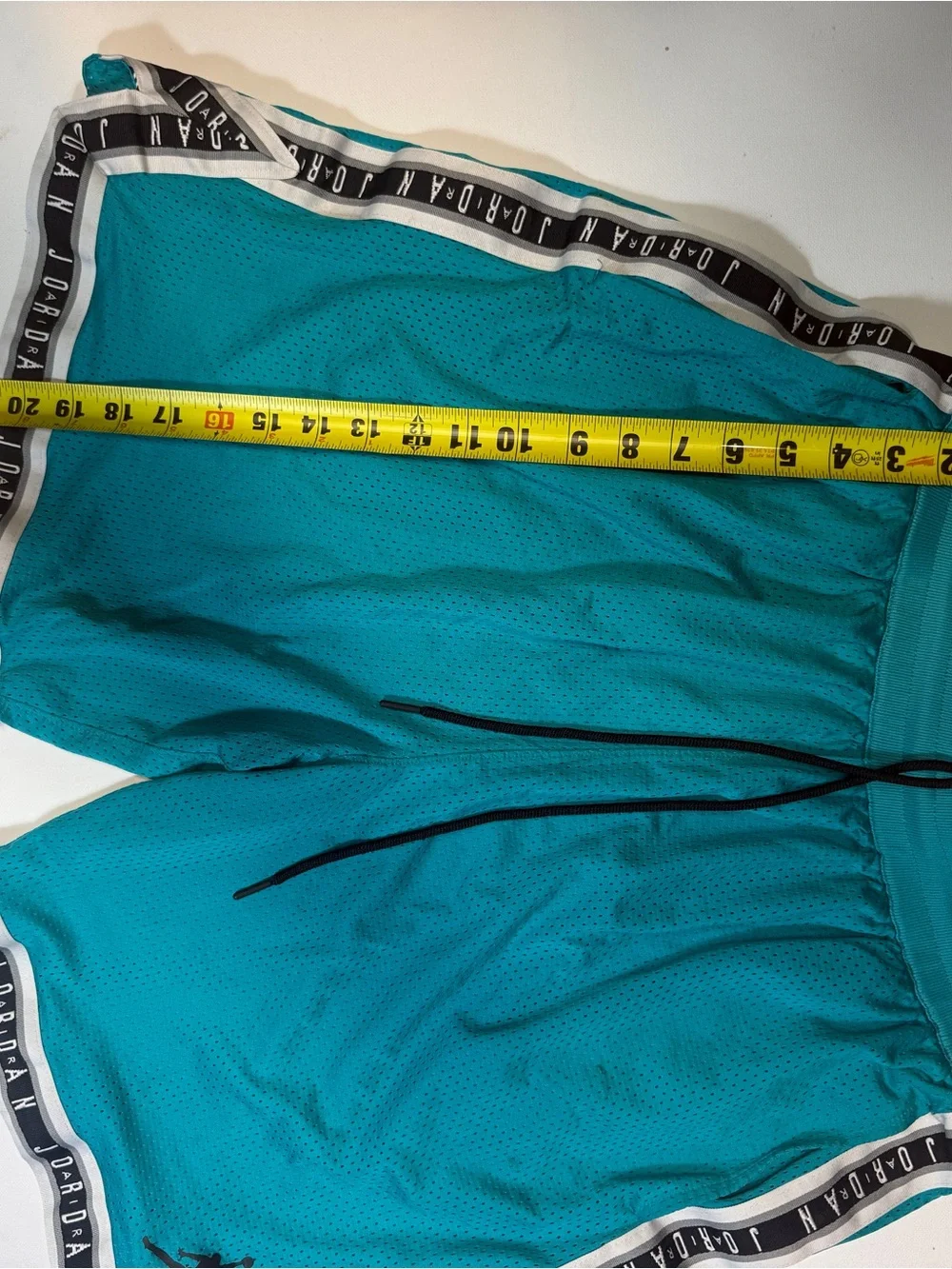 Jordan Teal Mesh Basketball Shorts with Black Trim